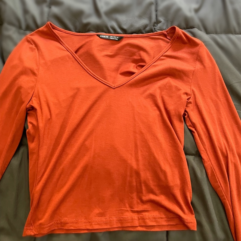 Long sleeved orange top